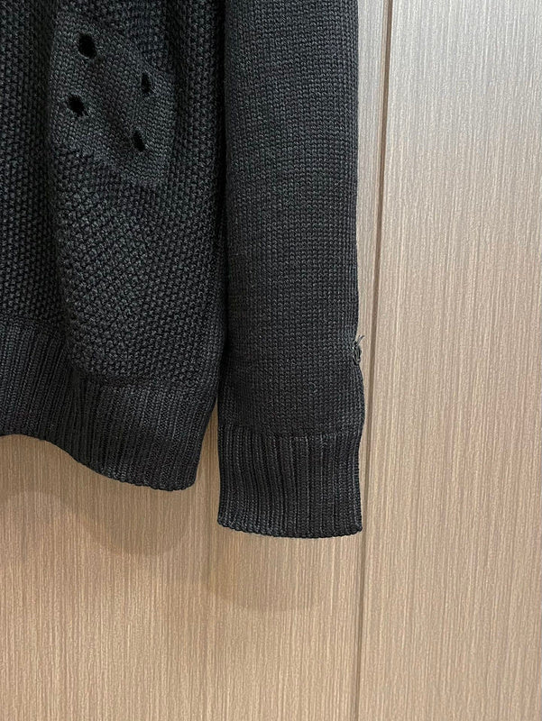 Back view of Louis Vuitton luxury clothing with monogram-inspired silhouette