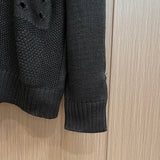 Back view of Louis Vuitton luxury clothing with monogram-inspired silhouette