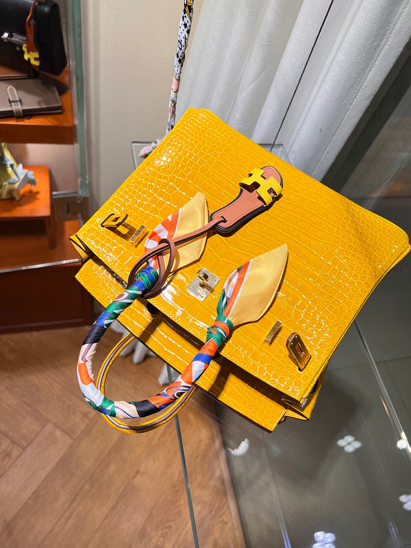Side view of curated structured handbag