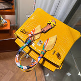 Side view of curated structured handbag