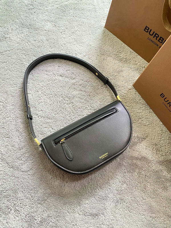 Ziva's Charm handbag – side angle view (one versatile size)