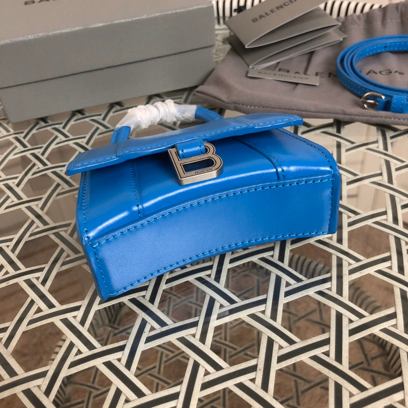 Styled lifestyle shot of everyday-luxe structured women's handbag – women's statement bag