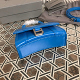 Styled lifestyle shot of everyday-luxe structured women's handbag – women's statement bag