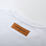Side profile of Louis Vuitton luxury clothing with contemporary cut