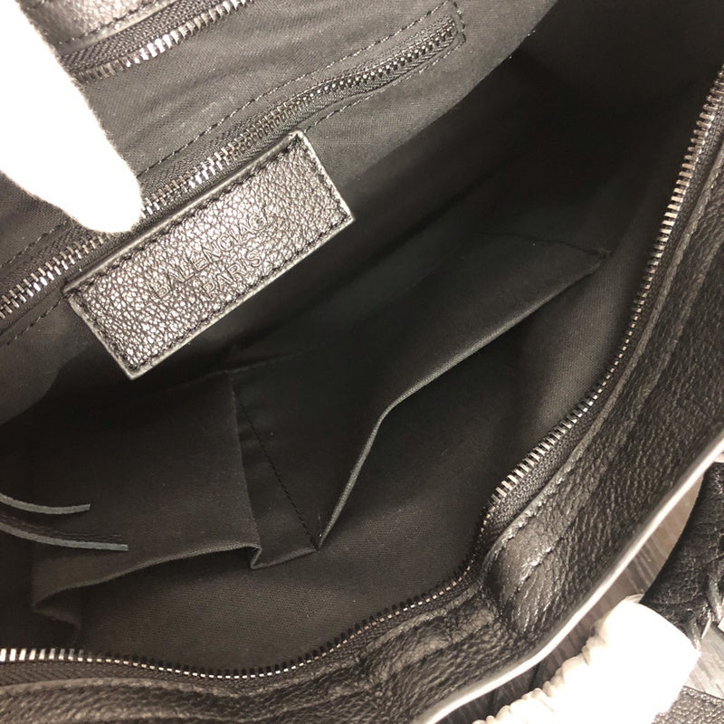 Side profile of chic structured women's handbag – women's statement bag