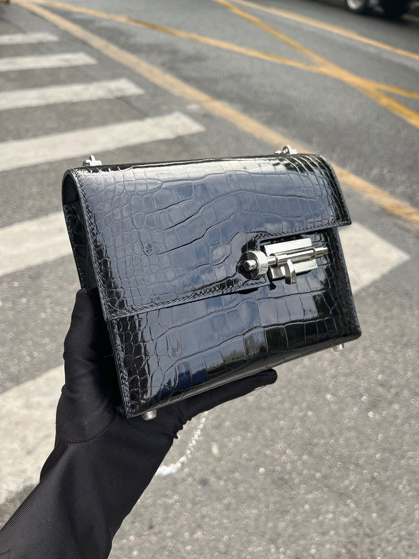 Side view of understated structured handbag