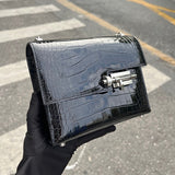 Side view of understated structured handbag