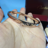 Front view of Cartier unisex jewelry piece