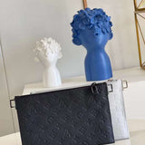 Styled lifestyle shot of elevated premium women's handbag – women's premium purse