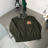 Back view of Louis Vuitton luxury clothing with signature branding