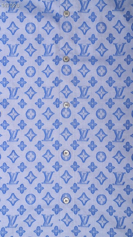 Flat lay presentation of Louis Vuitton luxury clothing with tailored silhouette