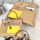 Side view of curated structured handbag