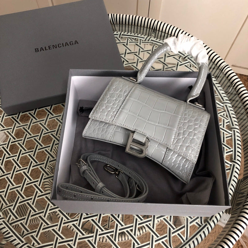Front view of sleek classic women's handbag – women's designer-style accessory