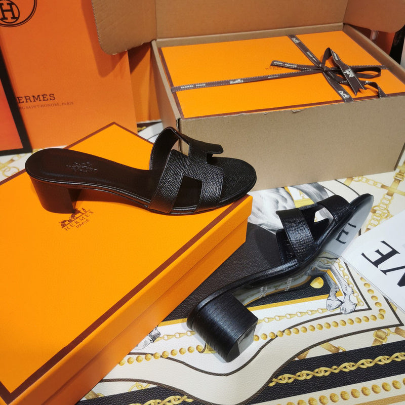 Hermès Black Slide Sandals - Lifestyle Styling Shot