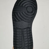 Side profile of Nike soft grey sneakers premium leather build