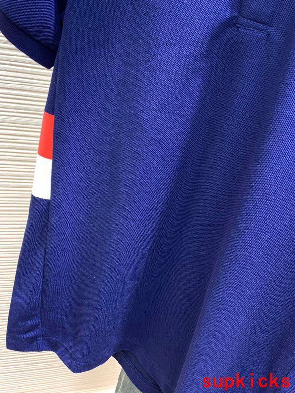 Back view of Moncler luxury clothing with signature branding