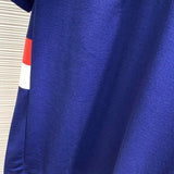 Back view of Moncler luxury clothing with signature branding