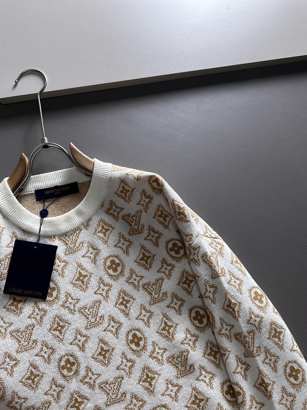 Close-up detail shot of Louis Vuitton luxury clothing with logo-detail design