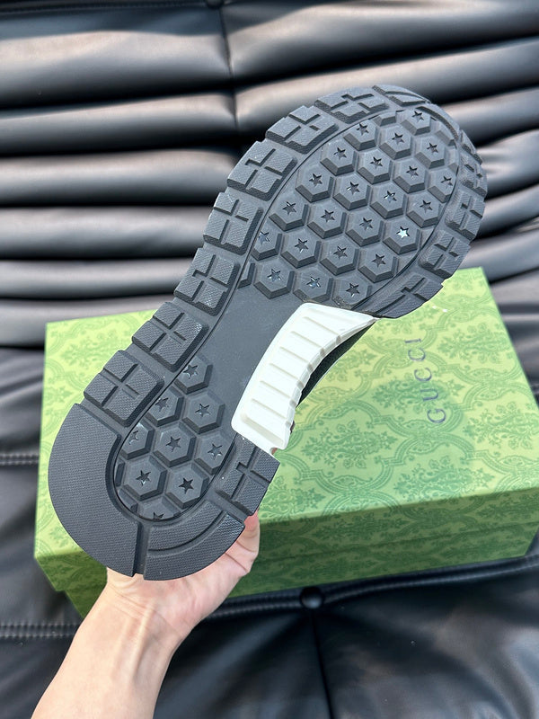 Side profile of Gucci clean off-white sneakers padded collar comfort