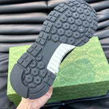 Side profile of Gucci clean off-white sneakers padded collar comfort