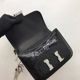 Close-up detail of poised bag design