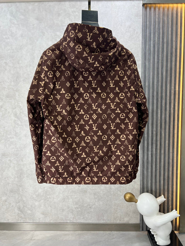 Flat lay presentation of Louis Vuitton luxury clothing with label-forward styling