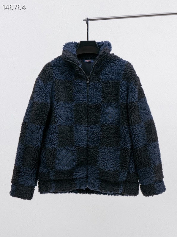 Close-up detail shot of Louis Vuitton luxury clothing with relaxed-fit cut