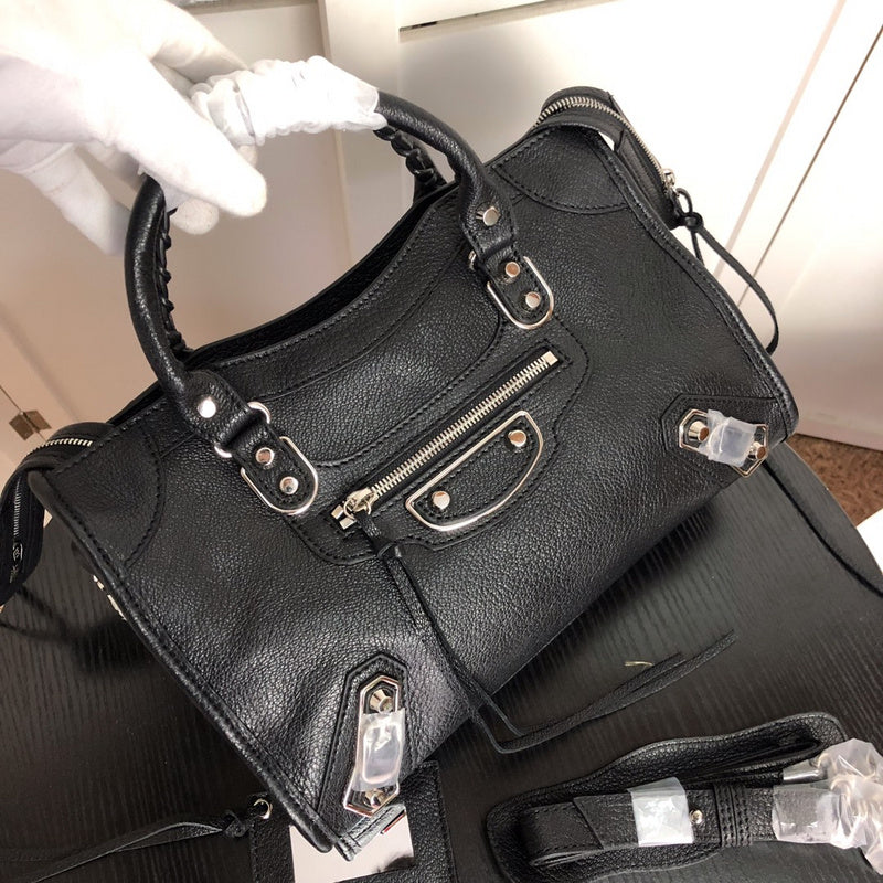 Top view of elevated modern women's handbag – women's statement bag