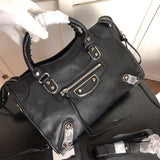 Top view of elevated modern women's handbag – women's statement bag