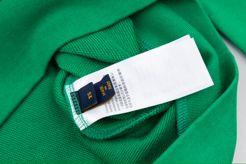 Close-up detail shot of Louis Vuitton luxury clothing with contemporary cut