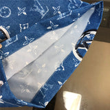 Side profile of Louis Vuitton cotton t-shirt with label-forward styling