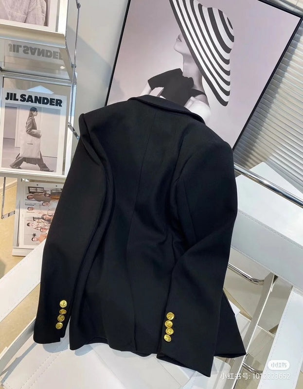 Front view of Louis Vuitton luxury clothing with logo-detail design
