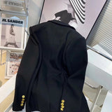 Front view of Louis Vuitton luxury clothing with logo-detail design