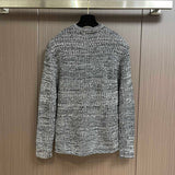 Side profile of Louis Vuitton luxury clothing with logo-detail design
