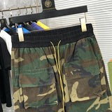 Side profile of Rhude luxury clothing with streetwear-inspired cut