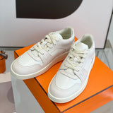 Hermes shoes Style 255 - close-up of classic monogram styling