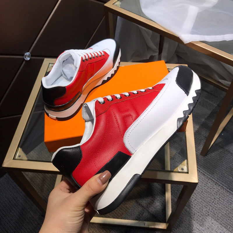 Hermès Red Slip-On Sneakers - Close-Up Texture View