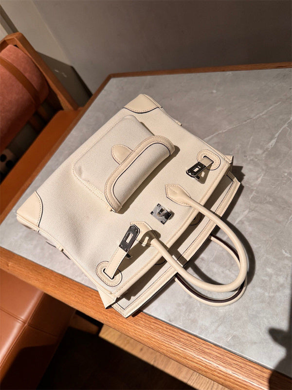 Side view of sculpted structured handbag