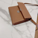 Side view of timeless structured handbag