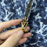 Back view of Louis Vuitton luxury clothing with runway-inspired design