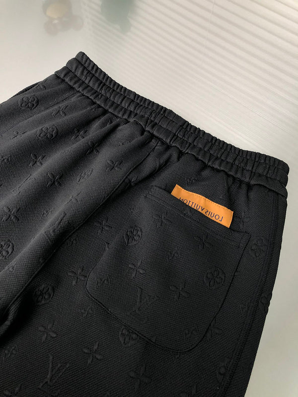Front view of Louis Vuitton luxury clothing with tailored silhouette