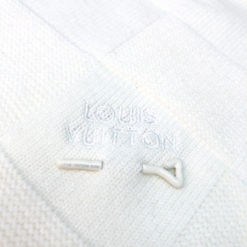 Full styled look of Louis Vuitton luxury clothing with monogram-inspired silhouette