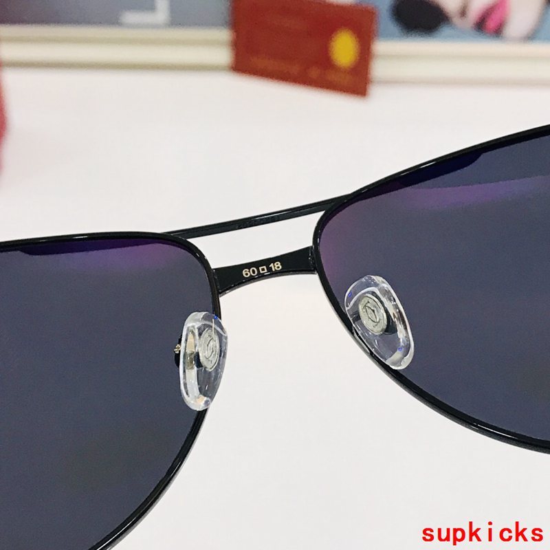 Close-up detail view of Cartier unisex sunglasses