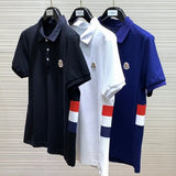 Close-up detail shot of Moncler luxury clothing with signature branding