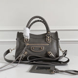 Zivas Charm Chic Craftsmanship Statement Handbag (Signature Shape & Finish) – Angled View