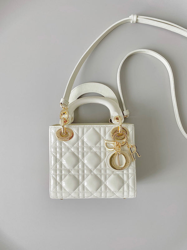 Close-up detail of structured signature women's handbag – women's designer-style accessory