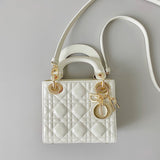 Close-up detail of structured signature women's handbag – women's designer-style accessory