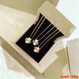 Lifestyle view of Van Cleef & Arpels unisex jewelry piece