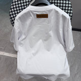 Side profile of Louis Vuitton cotton t-shirt with monogram-inspired silhouette