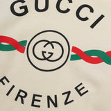 Flat lay presentation of Gucci luxury clothing with tailored silhouette